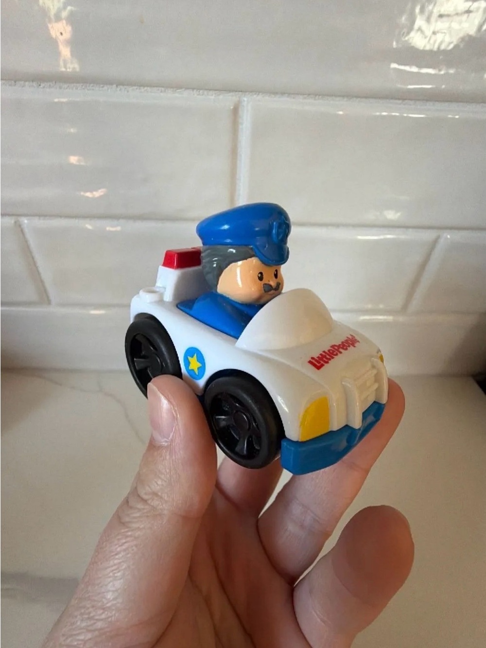 Little People Police Car Wheelie